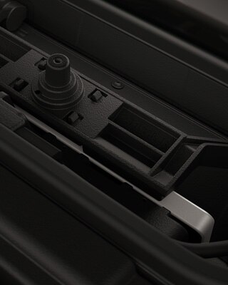 Integrated charging compartment with mobile phone.